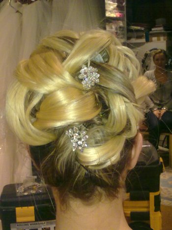 Wedding hair style with hair extensions and crystal hair pins
