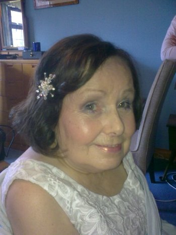 Mother of the bride hair style with sparkly hair grips